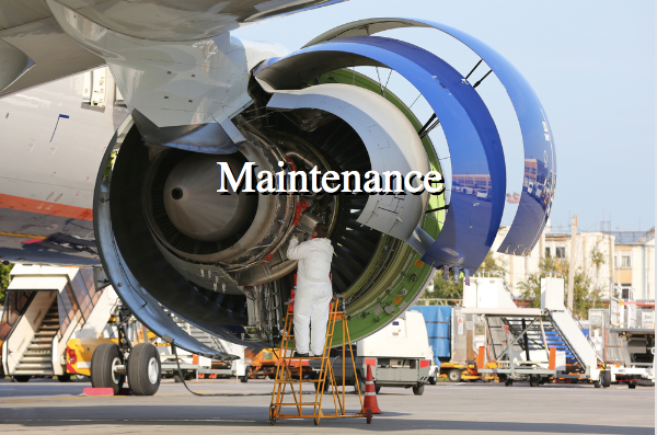 Mechanic servicing jet engine